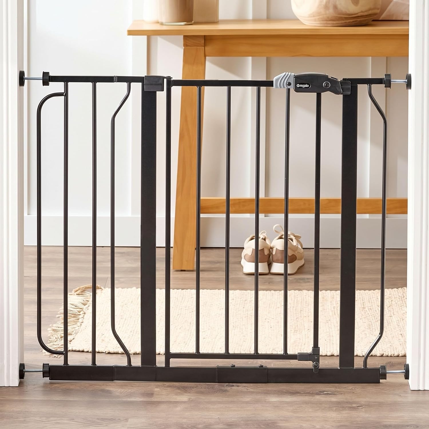 Regalo Safety 29-38.5" Baby Gate for Doorways & Bottom of Stairs, Pressure Mounted Baby Gate with Door for Babies, Toddlers & Pets, Tested & Safe for 30 Years, American Designed, American Owned, Black